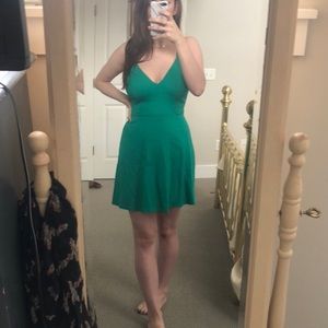Green sundress with strap details